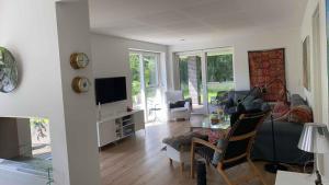 TV/trung tâm giải trí tại Cozy Holiday Home Near Coast And Nature