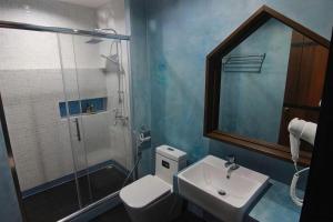 a bathroom with a toilet and a sink and a shower at BAANKONPAI in Pai +125 photos