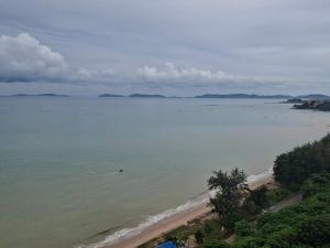 an aerial view of a beach and the ocean at Apartment on Beach, Stunning Views, Rayong in Ban Phayun