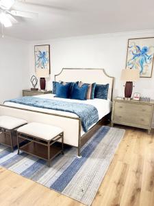 Ένα ή περισσότερα κρεβάτια σε δωμάτιο στο Blue Bay Cottage