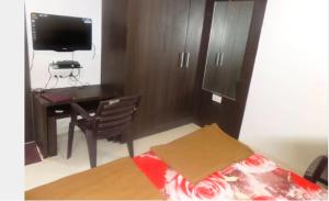 Et tv og/eller underholdning på Hotel New Punjab, Nashik