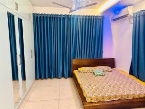 Postel nebo postele na pokoji v ubytování Momota-Neer