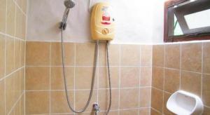 a shower in a tiled bathroom with a shower at Tamarina Resort in Ban Puk (1) +115 photos
