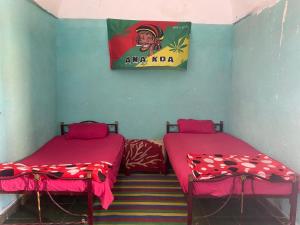 Ένα ή περισσότερα κρεβάτια σε δωμάτιο στο Bafana Bafana Guest House