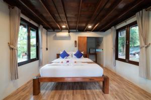 Postel nebo postele na pokoji v ubytování COCO Canopy Boutique Resort + 101 fotografií