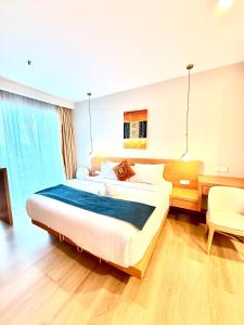 Postel nebo postele na pokoji v ubytování Crystal Suites at Ramad KLCC