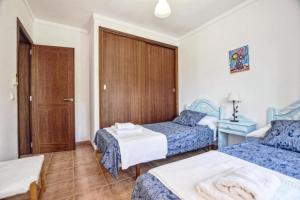 a hotel room with two beds and a table at Ines in Inca +18 photos