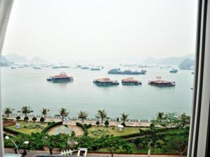 a view of a large body of water with boats in it at Hai Long Hotel Cat Ba in Cat Ba