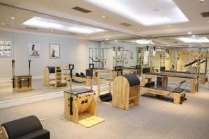 a room with many different types of furniture in it at Grand Metropark Hotel Nanjing in Nanjing