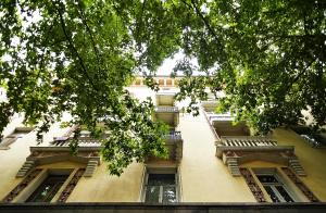 a tall building with balconies on the side of it at MGK Hotel in Tbilisi City