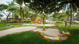 a park with a playground with a slide at Tanjung Lesung Beach Hotel in Kalicaah