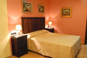 Postel nebo postele na pokoji v ubytování Hotel Pinomar