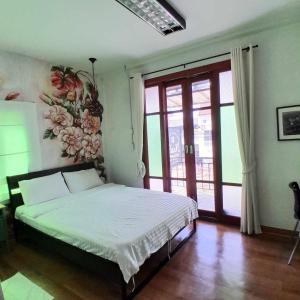 Postel nebo postele na pokoji v ubytování Baan Khun Nine + 5 fotografií