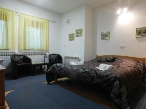 מיטה או מיטות בחדר ב-Apartment Sabina