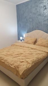 Postel nebo postele na pokoji v ubytování casa nedelcu