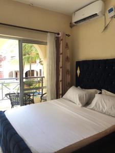 Postel nebo postele na pokoji v ubytování Razz Homes