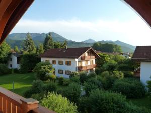 a view of a house with mountains in the background at Alpenpanorama vacation home in Bergen