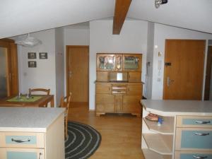 a kitchen with a table and a counter top at Alpenpanorama vacation home in Bergen