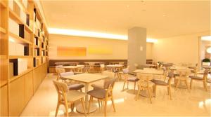 
A restaurant or other place to eat at JI Hotel Shanghai Tiantong Road
