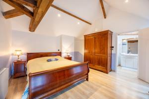 Postel nebo postele na pokoji v ubytování Gîte de la Nieultière