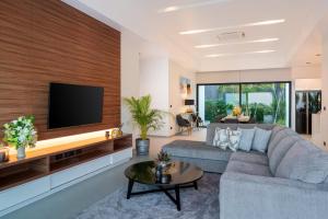 Télévision ou salle de divertissement dans l'établissement Sivana HideAway Villas Hua-Hin