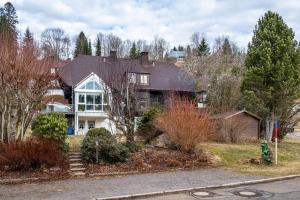 a large white house with a window at Haus Aretz in Feldberg