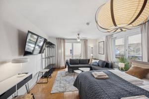 TV a/nebo společenská místnost v ubytování Kaiserstuhl Oase - 4BR, Küche, TV`s, Waschtrockner, Innenhof