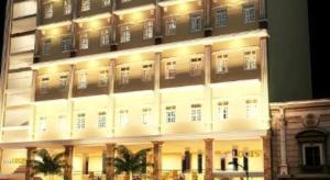 a lit up building with lights on at RUBY HOTEL in Cà Mau +36 photos