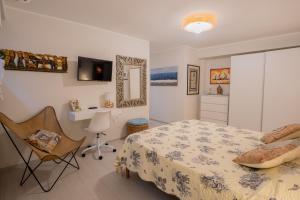 Et tv og/eller underholdning på Villa Liliana - Ancora - Esclusivo con Accesso Diretto alla Spiaggia