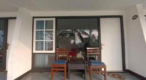 Balkón nebo terasa v ubytování Capital O 94094 New Lembah Nyiur