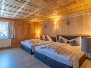 Postel nebo postele na pokoji v ubytování Stadlwirt Nauders