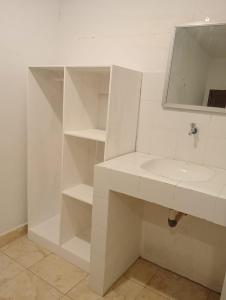 Koupelna v ubytování Sisilia Lodge + 8 fotografií