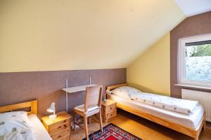 Ένα ή περισσότερα κρεβάτια σε δωμάτιο στο Ferienwohnung Ottow