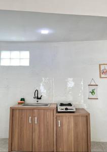 Kuchyň nebo kuchyňský kout v ubytování Rahayu Cabin Villa