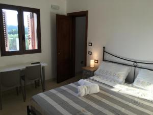 Postel nebo postele na pokoji v ubytování Villa Elia - Tenuta Le Scerze - Salento Homes