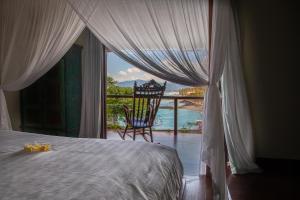 Giường trong phòng chung tại Villa Casa Doudou +46 ảnh