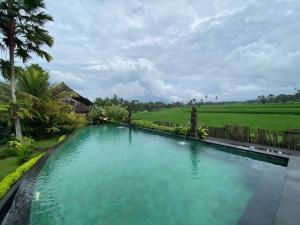 Πισίνα στο ή κοντά στο Padi Bali Villa