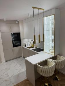 Køkken eller tekøkken på Apartament Villa Piano