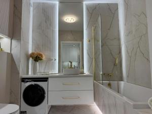 Et badeværelse på Apartament Villa Piano