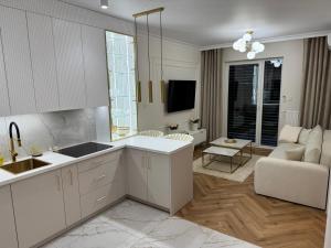 Et tv og/eller underholdning på Apartament Villa Piano