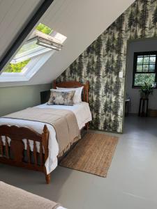 Ένα ή περισσότερα κρεβάτια σε δωμάτιο στο Vogelsang Loft