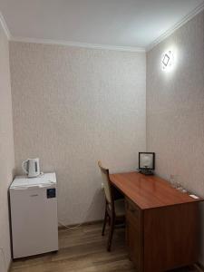 Η κουζίνα ή μικρή κουζίνα στο Готель Elisavetgrad