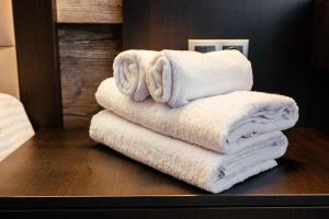 Ένα ή περισσότερα κρεβάτια σε δωμάτιο στο Bright & Modern Flat by the Circus +39 φωτογραφίες