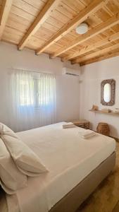 Cama o camas de una habitación en Vive Mar Paxos