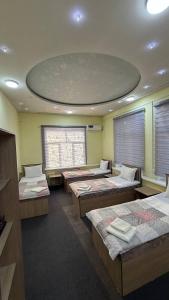 Ένα ή περισσότερα κρεβάτια σε δωμάτιο στο Aqso Hotel +5 φωτογραφίες