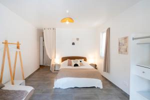 Postel nebo postele na pokoji v ubytování Gîte Au Milieu D'un Airial