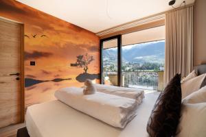 Postel nebo postele na pokoji v ubytování Levita Living Wolke