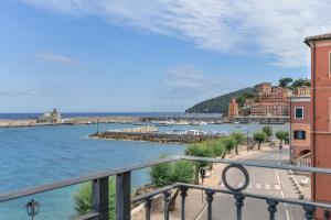 a view of a body of water from a balcony at Residenza Rio Marina de luxe in Rio Marina
