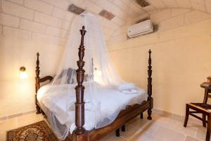 Ένα ή περισσότερα κρεβάτια σε δωμάτιο στο Lamia with pool