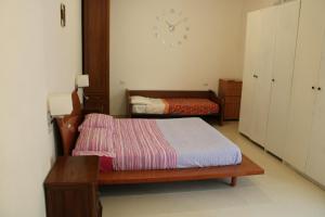 Postel nebo postele na pokoji v ubytování Stella Marina